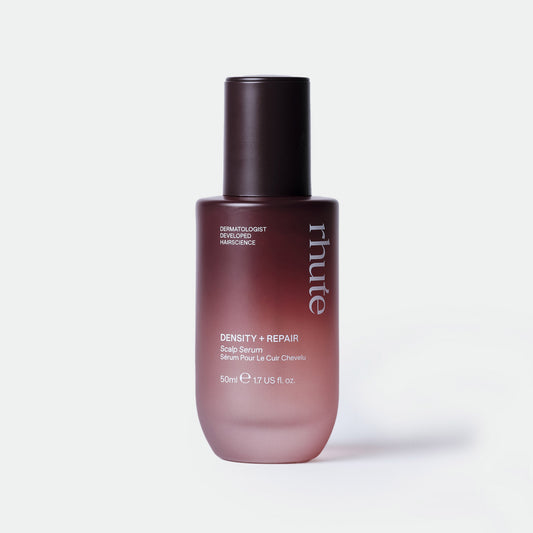 Bottle of Rhute Density + Repair Scalp Serum on a white background